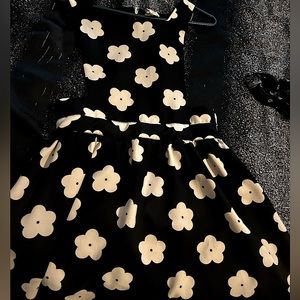 One clothing black dress with white flowers